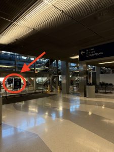 This image shows the exit door to take for hotel shuttles.